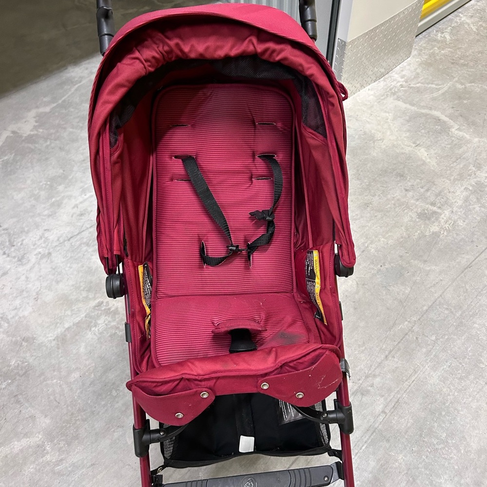 Red Stroller with Adjustable Canopy